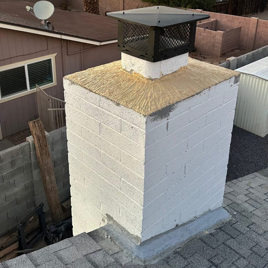 Freshly repaired chimney crown with new chimney cap installed by EcoAirClean.